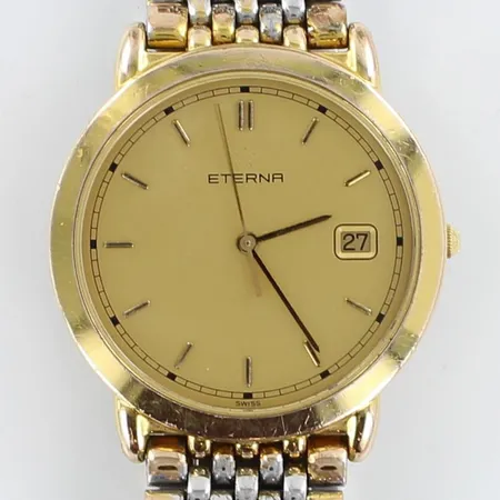 Teräsrannekello Eterna, Numeroitu 2101.22, Teräs-/osittain kullattu, Quartz, taulun Ø 33mm, rannekkeen pituus 160mm, kultaus osittain kulunut rannekkeessa