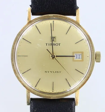 Kultarannekello, Tissot Stylist, mekaaninen, taulun Ø33mm, nahkaranneke, lasissa naarmuja, alkuperäinen ranneke ja laatikko, 585br, Paino: 30,4 g