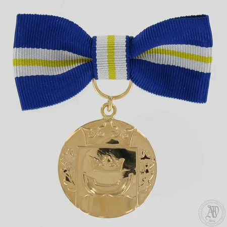 Helsinki-mitali, korkeus 65mm ja leveys 32mm, 750br, Paino: 32,6 g