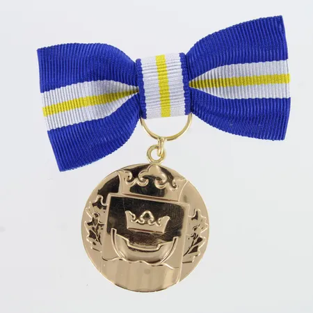 Helsinki-mitali, korkeus 64mm, Ø 30mm, 750br,   Paino: 32,5 g