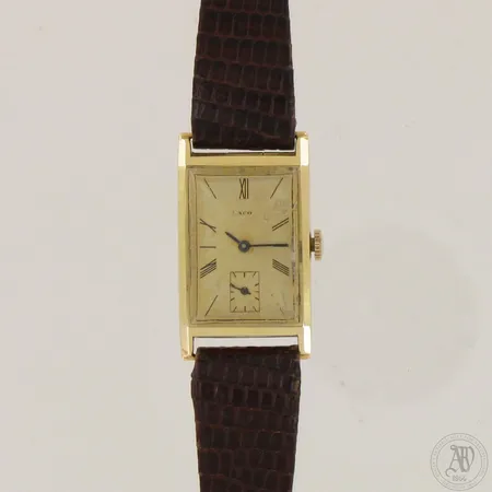 Kultarannekello Laco, mekaaninen, mitat 27x20mm, selviä käytön jälkiä ja taulussa kulumaa, rannekkeen pituus 155-190mm, 585br,  Paino: 20,9 g