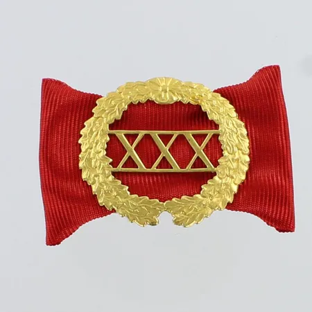 Rintamerkki, korkeus 33mm, korumetallia, 