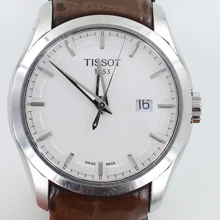 Teräsrannekello Tissot Couturier, TO35410 A, kaiverrettu, Quartz:paristo loppunut, taulun Ø 41mm, pieniä käytön jälkiä