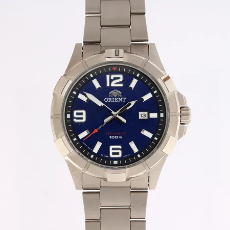 Titaanirannekello, Orient, quartz, rungon Ø 43mm, rannekkeen pituus 180mm, kolme jatkopalaa, laatikko ja takuukortti
