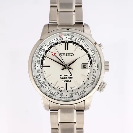 Teräsrannekello, Seiko, World Timer GMT Kinetic, quartz, ref. 5M85-0AF0, rannekkeen pituus 180mm, kaksi jatkopalaa, laatikko, takuukortti