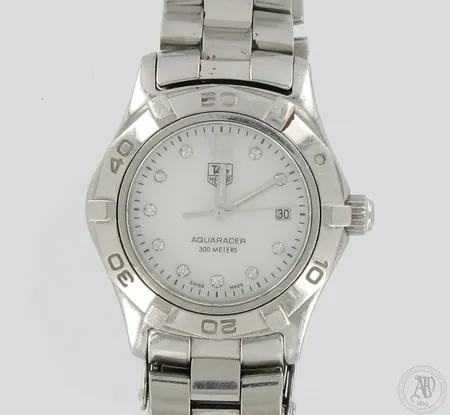 Teräsrannekello timanteilla (yht.0.07ct) Tag Heuer Aquaracer, WAF1415.BA0813, quartz:paristo loppunut, taulun Ø 27mm, teräsosissa käytön jälkiä, ranneke löystynyt, rannekkeen pituus 165mm, laatikko ja takuukortti