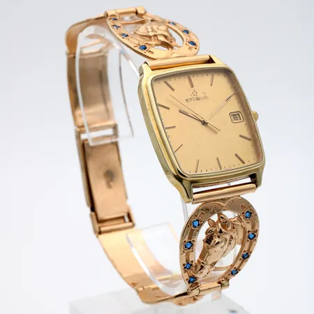 Kultarannekello Eterna, taulun koko 29x30mm, quartz, kaiverrettu, hihnan pituus 215mm, 585br,