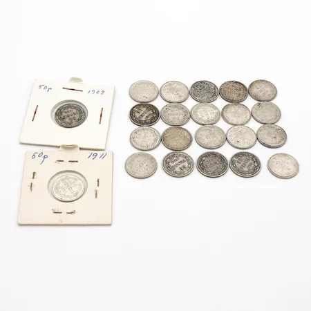 22 hopearahaa, 50 penniä, vuosilta 1892-1917, yht. nimellisarvo 11 markkaa, 750 hopea, Paino: 55,6 g