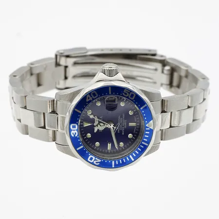 Teräsrannekello, Invicta, taulun Ø 25mm, quartz:paristo loppunut, rannekkeen pituus 145mm, 