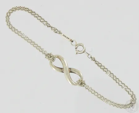 Rannekoru, Infinity, Tiffany & Co, pituus 170mm, leveys 3-8mm, 925,  Paino: 3,2 g