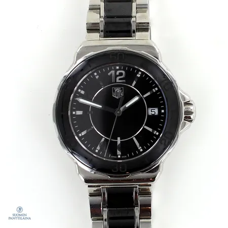 Teräsrannekello Tag Heuer, WAH1210, Swiss Made, quartz, S:N EBA3631, rungon Ø34.5mm, teräsrannekkeen pituus 195mm, laatikko ja paperit