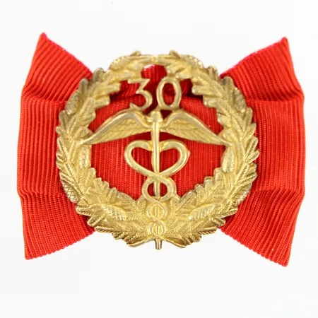 Keskuskauppakamarin ansiomerkki 30 vuotta, korkeus 34mm, leveys 49mm, 830br Paino: 7,5 g
