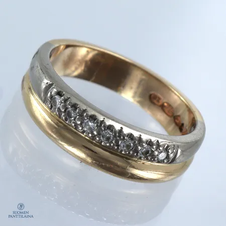 Timanttisormus 7xn.0.01ct, koko 17½, 585 kelta- ja valkokulta,  Paino: 5,5 g