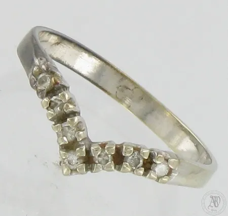 Timanttisormus 7xn.0.02ct, koko 18, 585br valkokulta, Paino: 1,6 g