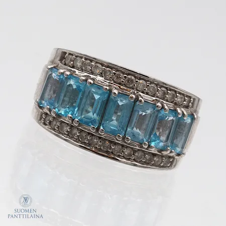 Timanttisormus kivillä 26xn0.01ct, koko 17½, leveys 6-11mm, 585br valkokultaa, Paino: 6,9 g