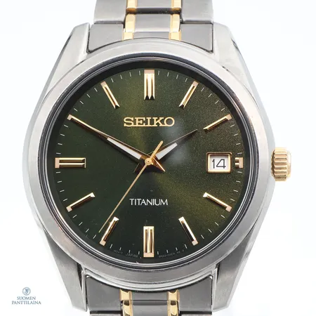 Titanium-rannekello Seiko, quartz, päivyri, rungon Ø 39mm, rannekkeen pituus 185mm, sn. 096047, mukana takuukortti, kaksi lisäpalaa ja laatikko.
