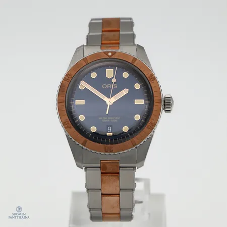 Teräsrannekello Oris Divers Sixty-Five, automaatti, rungon Ø 40mm, ranneke teräs/pronssi, sininen taulu, ref. 01 733 7707 4355, sn. 3839181, rannekkeen pituus 200mm, mukana manuaali, takuukortti ja laatikko. Kuin uusi. 
