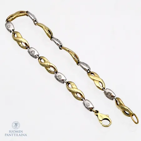 Timanttirannekoru 8xn.0.03ct, yksi timantti viallinen, pituus 185mm, käytön jälkiä, 750br valko- ja keltakultaa, Paino: 11,1 g