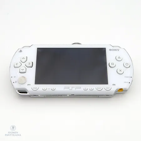  Pelikonsoli Sony PSP, 5 peliä, virtajohto, käytön jälkiä, suojapussi