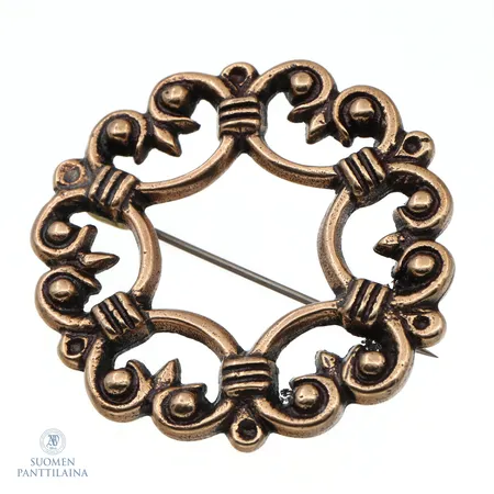 Rintaneula, Suotniemen solki, Kalevala Koru, leveys 46mm, pronssia 