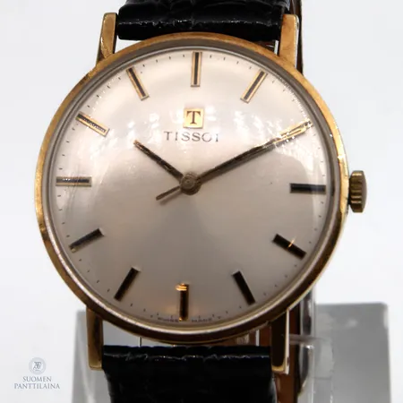 Kultarannekello Tissot, manuaalinen, Swiss Made, kaiverrettu, rungon Ø33mm, kulunut nahkaranneke, ranneke ei alkuperäinen, rannekkeen pituus 170-205mm,  Paino: 26,8 g
