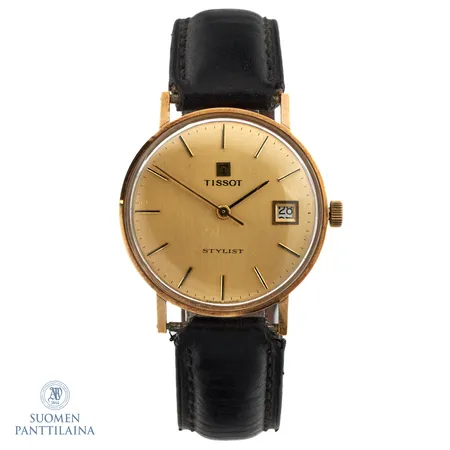 Kultarannekello, Tissot Stylist, mekaaninen, taulun Ø33mm, pleksi lasissa naarmuja, päivyri ei toimi kunnolla, kaiverrettu, nahkaranneke ja laatikko
