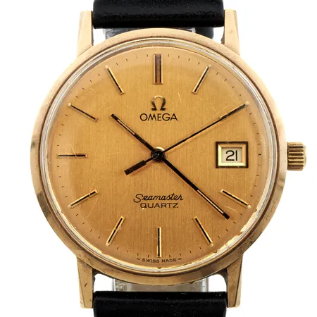 Viallinen kultarannekello, Omega Seamaster Quartz, paristo loppunut ja tappi viallinen, rungon Ø 34mm, kaiverrettu, nahkaranneke ei alkuperäinen, 585br,
