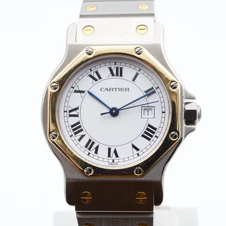 Rannekello Cartier Santos Octagon, teräs/kulta, automaatti, ref. 296647473m rungon Ø 29mm, rannekkeen pituus 200mm, rannekkeessa selviä käytön jälkiä, huollettu Lindroosilla 9.12.2024, mukana alkuperäinen laatikko ja huoltokuitit.