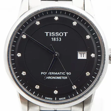 Teräsrannekello, Tissot, Luxury automatic, timanttitaulu 12xn.0.008ct, automaatti, rungon Ø 41mm, rannekkeen pituus 190mm, Powematic 80, safiirilasi, ref. T086.408.11.056.00, lasissa kulumaa, laatikko, jatkopala ja takuukortti Paino: 0 g