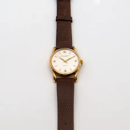 Kultarannekello IWC nahkarannekkeella, automaatti, 21 kivinen, C. 852, 1324107, Ø 35mm, pituus 170-220mm, 750br, 