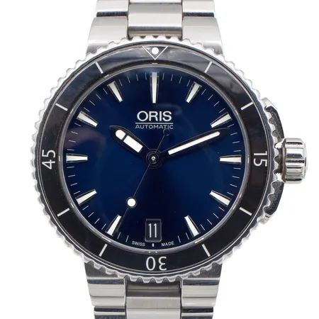 Teräsrannekello Oris Aquis, automaatti, rungon Ø 36mm, ref. 7652 sr. 33-02710, rannekkeen pituus 170mm, kaksi jatkopalaa, laatikko ja kuminen vaihtoranneke
