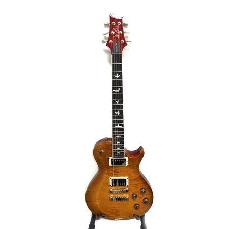 Sähkökitara PRS, Paul Reed Smith McCarty SC594, made in USA, S:N S2055596, skaala 24.594", mahonki runko vaahtera kannella, mahonki kaula ruusupuu-otelaudalla, 22 nauhaa, kaksi humbucker mikrofonia 58/15 LT, kaksi volumea, kaksi tonea joissa push/pull mikrofonien puolitukset, 3-tie mikrofonivalitsin, kaksiosainen talla, pehmeä laukku