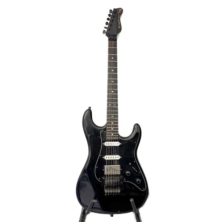 Sähkökitara Valleys Arts M series Standard , S:N 5597, 1980-luku, made in Japan, vaahterakaula eeben-otelaudalla, saarni runko, väri musta, FloydRose-talla, mikrofonit ei alkuperäiset, kaksi single mikrofonia Seymour Duncan, yksi humbucker mikrofoni, 5-tie mikrofonivalitsin, yksi volume, yksi tone, pintavikoja, käytön jälkiä, kulunut kova laukku, 