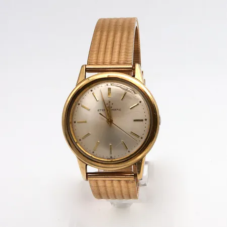 Teräsrannekello Eterna, automaatti, Ø 34mm, lasi viallinen ja ranneke viallinen, kaiverrettu, laatikko