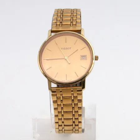 Kultarannekello Tissot, taulun Ø 28mm, Quartz:paristo loppunut, metallirannekkeen pituus 200mm, kaiverrettu,  585br  Paino: 57,5 g