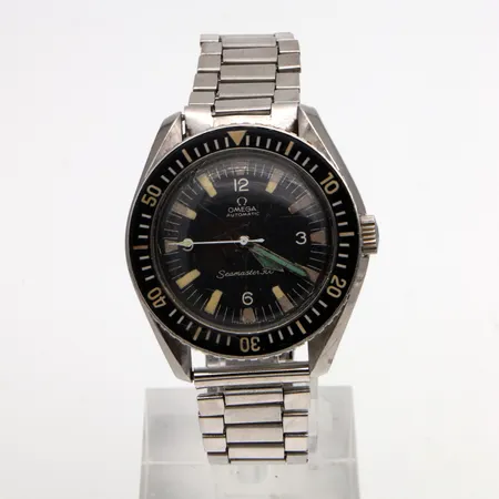 Teräsrannekello Omega, Seamaster 300, ref.165.024, taulun Ø 42mm, rannekkeen pituus 200mm, lasissa naarmuja, rannekkeessa kulumia