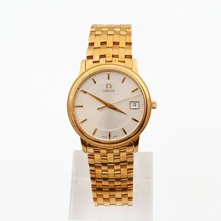 Kultarannekello, Omega, De Ville, quartz, sarjanumero 55897342, taulun Ø34mm, rannekkeen pituus 175mm, 750br,  Paino: 129,8 g