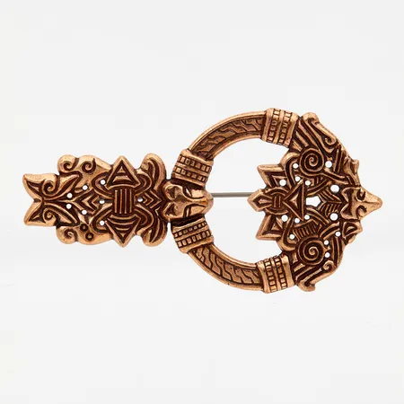 Rintakoru, Sudenpääsolki, Kalevala, korkeus 75mm, leveys 39mm, pronssia.