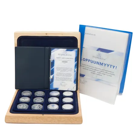 Juhlarahasarja Suomen Hopea-aarre, 36 juhlarahaa, todistuskirja Rahapaja Oy, puulaatikko, 925, Paino: 936 g