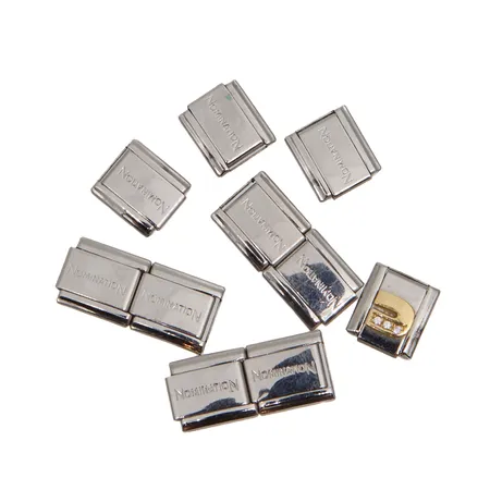 Kymmenen Nomination-rannekoru palaa, metallia