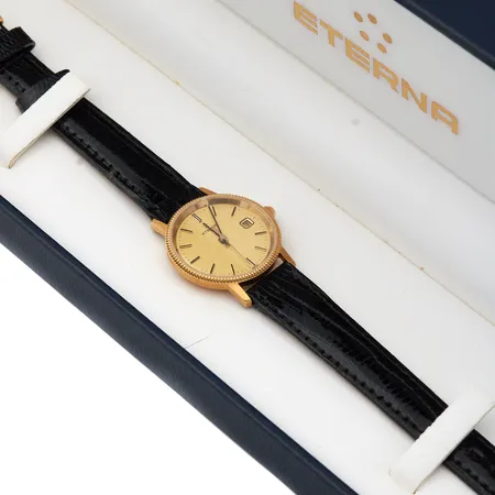 Kultarannekello Eterna quartz nahkarannekkeella, paristo loppu, halkaisia 24mm, 750br, nahkarannekkeella, laatikko ja paperit.