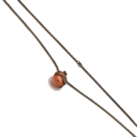 Kivikaulakoru Kalevala, Tintti, ketjun pituus 81cm, riipuksen korkeus 27mm, ketjussa käytön jälkiä, pronssi