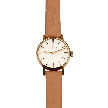 Kultarannekello Eterna, Ø 21mm, 152, manuaalivetoinen, kaiverrettu, nahkarannekkeella, 585br, Paino: 14,5 g