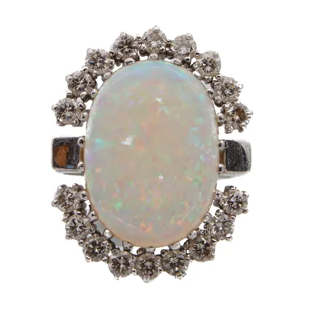 Opaalisormus timanteilla 18xn.0.04-0-05ct, opaalin mitat 13,2x18,5mm, tekijäkeima VVH, koko 17¼, 750br valkokulta, Paino: 11,6 g