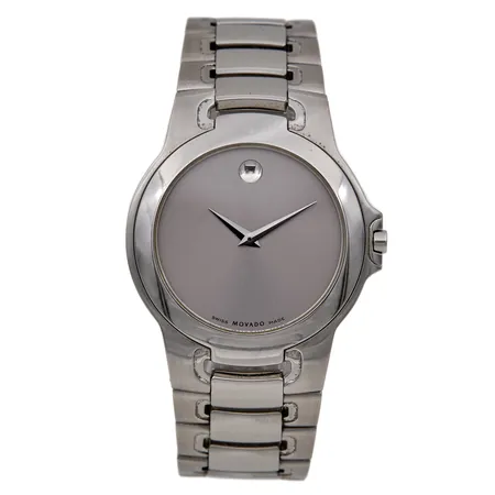 Teräsrannekello, Movado Museum Classic, quartz, rungon Ø 36mm, ref. 84 G1 1898, rannekeen pituus 175mm, rungossa ja rannekkeessa normaaleja käytön jälkiä