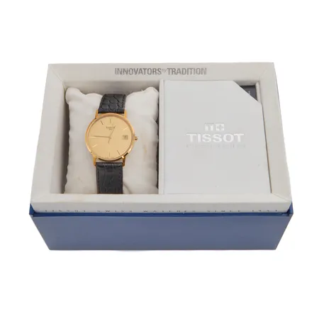 Kultarannekello Tissot 1853, quartz:paristo loppunut, kaiverrettu, rungon Ø 33mm, nahkaranneke, 750br, laatikko ja todistus Paino: 30,7 g