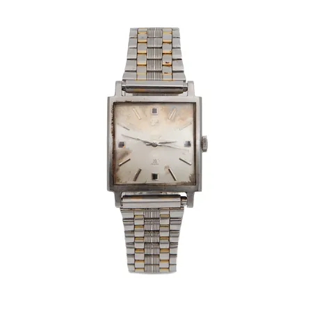 Teräsrannekello Girard Perregaux, automaatti, 39 jewels, rungon mitat 29x29mm, rannekkeen pituus 195mm, taulu hapettunut ja viisarit kuluneet, ranneke löystynyt, rungossa käytön jälkiä.