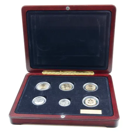 Rahasarja Kultaiset jäähyväiset markalle 2001, 4996 / 5000, proof, Rahapaja Oy, sisältää 10mk, 5mk, 1mk, 50p, 10p ja kultaisen muistomitalin 1 markka vuodelta 1864, puulaatikko ja todistus, 900, Paino: 8,6 g