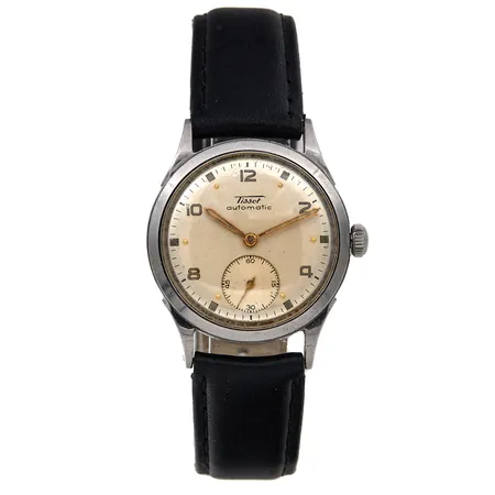 Teräsrannekello, Tissot, automaatti, rungon Ø 33mm, lasissa pieniä jälkiä, rungossa naarmuja, takana kaiverrus, viallinen nahkaranneke