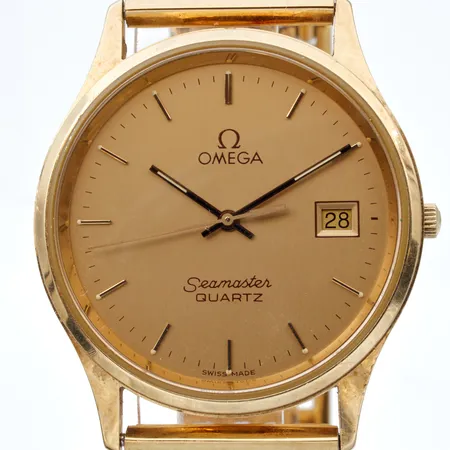 Kultarannekello Omega Seamaster, Ø 33mm, 196750 BZ, caliber 1430, sn. 46578874, 6-kivinen, kaiverrettu, quartz; paristo loppunut, rannekkeen pituus 210mm, ranneke metallia. Paino: 0 g